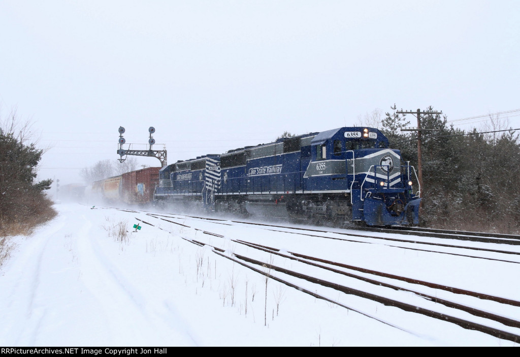 6355 & 6303 kick up the snow as they head south with Z127